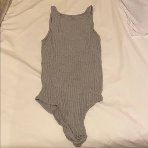 Grey crisscrossed back bodysuit
